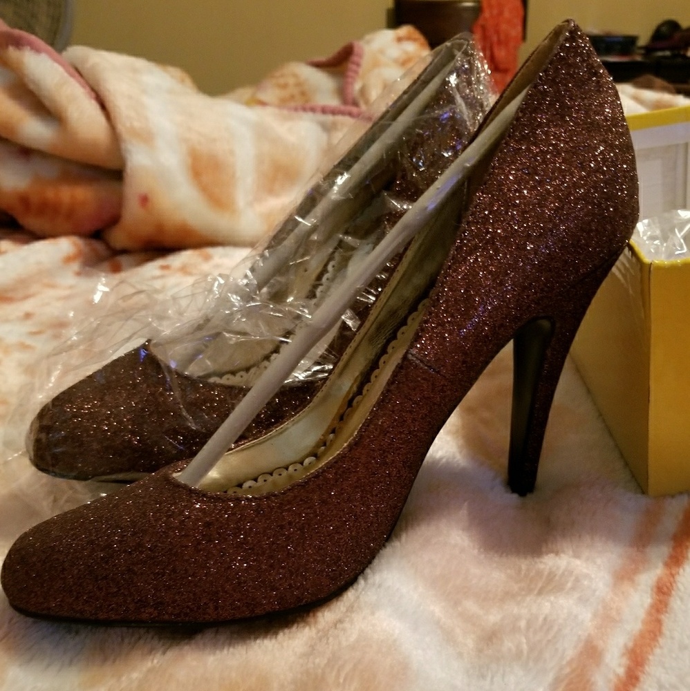 Brown glittery size 8 heels.